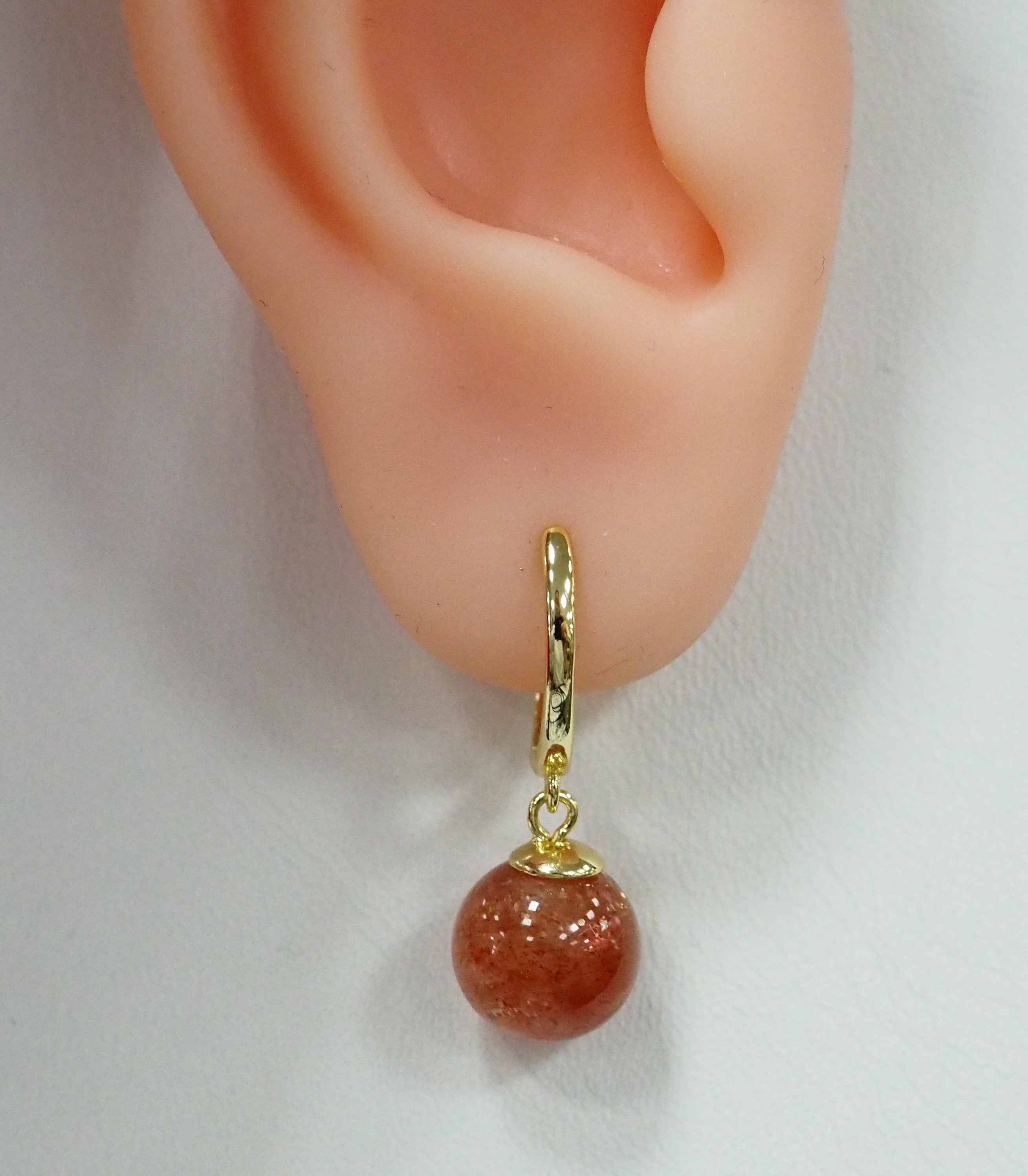 Серебряные серьги с солнечными камнями